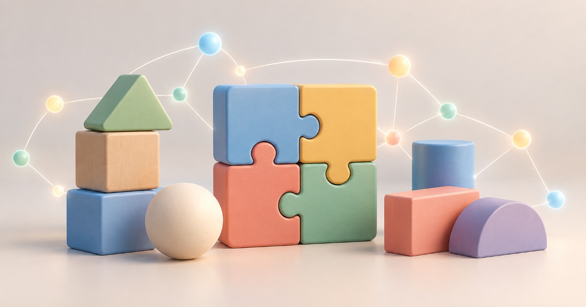 Geometrické bloky a puzzle dílky skládající se do sebe jako symbol základních pojmů pro začátečníky